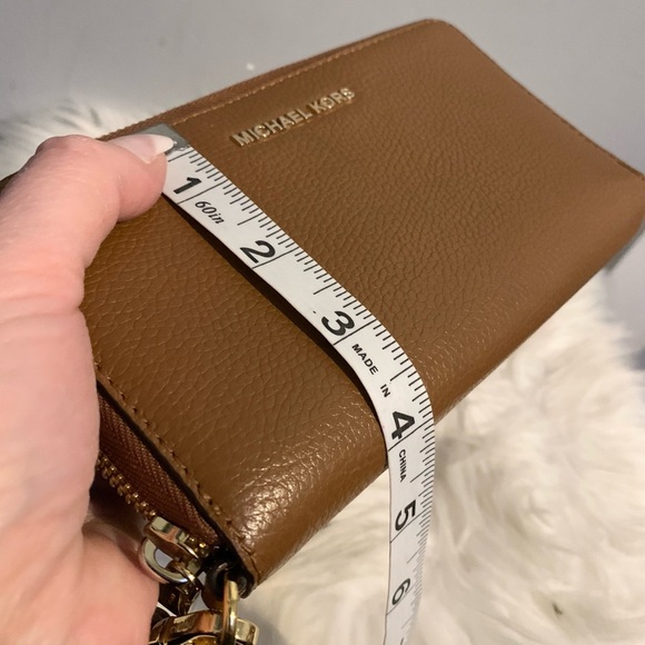 Authentic Michael Kors brown leather zippy wallet / wristlet
